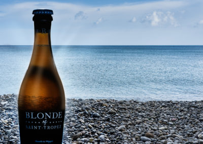 beer bottle with sea background
